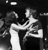 Yoko Ono en John Lennon tijdens One to One Benefit Concert