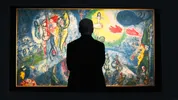 Dmitry Rybolovlev voor het kunstwerk van Marc Chagall, Le Grand Cirque, 1956