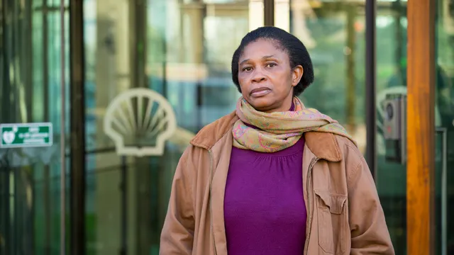 Esther Kiobel who is taking on one of the world’s biggest oil companies – Shell – in a final fight for justice. She has pursued them for more than 20 years, accusing Shell of colluding in her husband’s killing. 
Shell’s quest for oil in the Niger Delta, facilitated by the Nigerian government, resulted in decades of pollution, devastating the local community. In response, this community of Indigenous Ogoni people launched a protest movement in the 1990s that government security forces – at Shell’s insistence – took every opportunity to crush. 
Their efforts culminated in the 1995 sham trial and subsequent hanging of the leaders of the Ogoni resistance as well as Esther’s husband, Dr Barinem Kiobel. 
The killing of the Ogoni 9, as they later became known, prompted a global outcry. Amnesty International called on our vast network of supporters to deluge the Nigerian authorities first with appeals for the men’s freedom, and later with letters of outrage. Ultimately, however, it is Esther alone who has endured repeated hardship in her struggle to have her husband’s name cleared. 
In a classic David vs Goliath face-off, Esther will finally see her case with Shell go to court this June in the Netherlands. Is her 22-year battle for justice about to end?