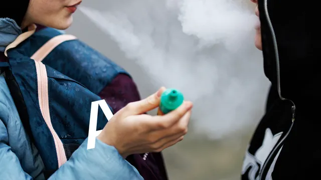 Two women vaping