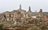 The ruins of old village of Belchite, in Aragon stand on November 12, 2015. In the lead-up to the forty years since Franco's death, historians still working to demolish the myths that the Spanish dictator himself had created by constantly rewriting history to perpetuate his rule. (1939-1975). Franco ordered that the ruins be left untouched as a "living" monument of war. AFP PHOTO / GERARD JULIEN