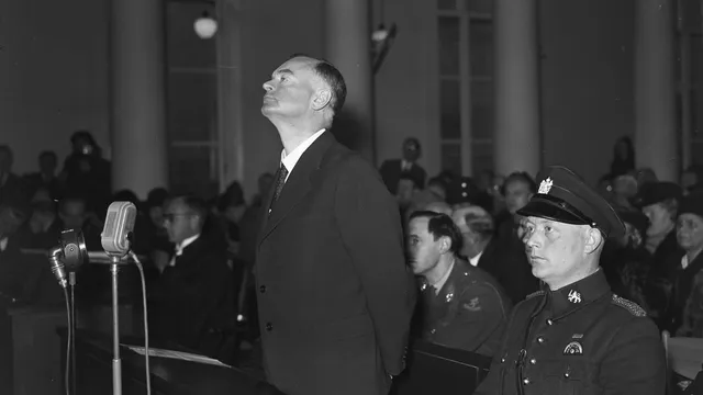 Het_proces_van_Mussert._Mussert_luistert_naar_de_aanklacht,_Bestanddeelnr_901-1472