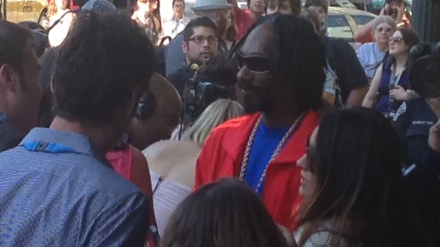 Snoop Lion op de rode loper bij de première van Reincarnated