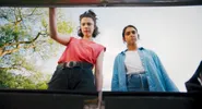(L to R) Margaret Qualley as "Jamie" and Geraldine Viswanathan as "Marian" DRIVE-AWAY DOLLS