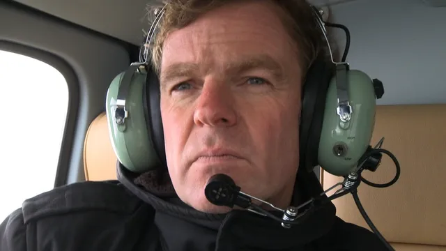 Winy Maas in helicopter