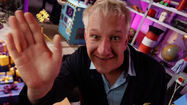 Maarten Bel die zwaait naar de camera