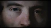 Close up van een schilderij van een paar ogen