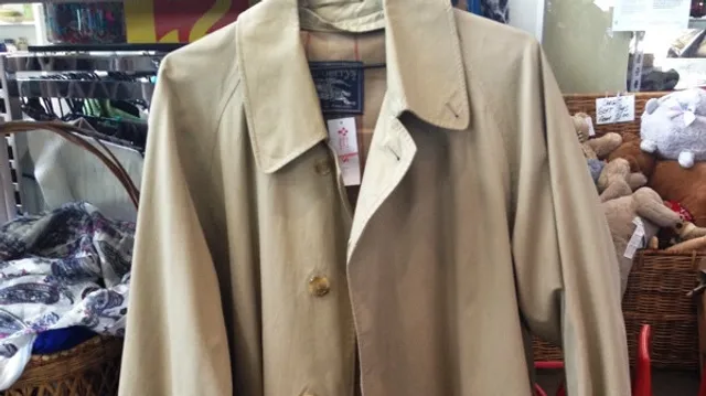 Oude jas met vlekken