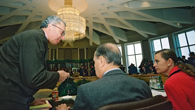 Jacques Delors, President of the CEC, François Mitterrand, President of the French Republic, and Elisabeth Guigou, Minister attached to the French Minister for Foreign Affairs, with responsibility for European Affairs, in the meeting room of the European Council (from left to right)
