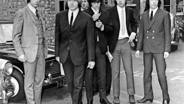 A file picture taken in London, on July 22, 1965, shows members of the Rolling Stones band (L-R) Charlie Watts, Brian Jones, Keith Richards, Mick Jagger and Bill Wyman. Most London shoppers rush by 165 Oxford Street without a second glance -- but it was here 50 years ago that The Rolling Stones played their first gig and changed the landscape of pop music forever. Mick Jagger, Keith Richards and Brian Jones played The Marquee Club on July 12, 1962 with three others, the first time they performed under the band name which would become synomymous worldwide with excess and muscial flair.