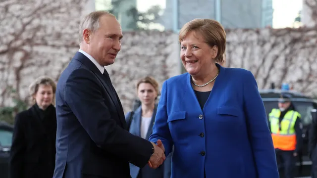 foto merkel en Poetin