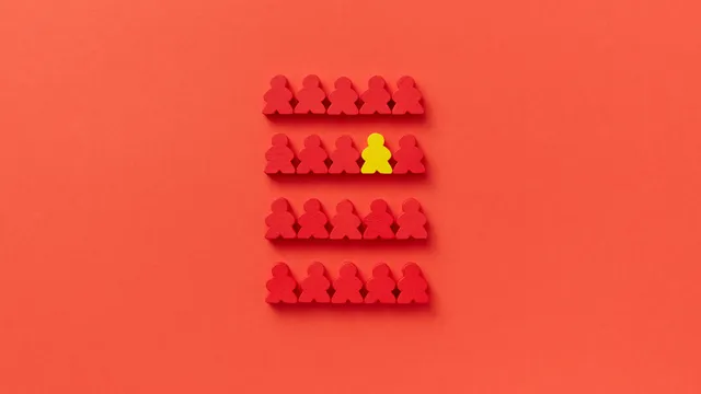 Rode poppetjes en een geel poppetje op een rode achtergrond