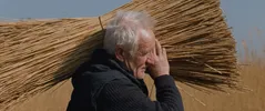 Rietsnijder Gerrit Knobbe in de film Rietland